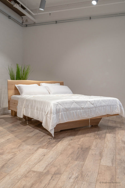 Zijaanzicht van een dekbed die op een bed ligt